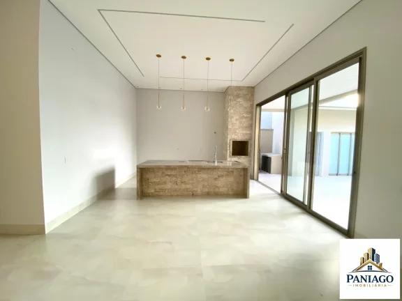 Imagem Casa de alto padrão com 3 suítes, cozinha gourmet e piscina com cascata