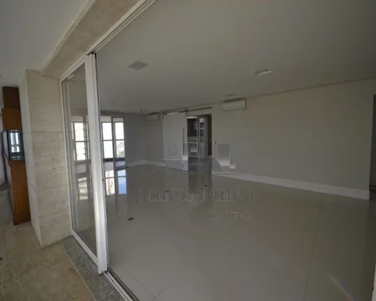 Imagem Apartamento com living amplo para 03 ambientes, terraço com churrasqueira, piso de mármore, sala d...