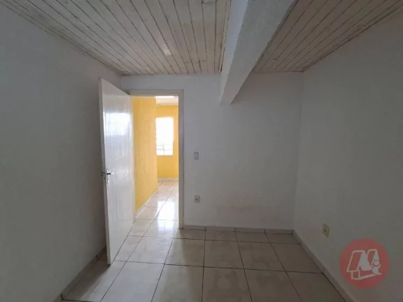 Imagem Casa com 3 dormitórios para alugar, 56 m² por R$ 1.916,00/mês - Medianeira - Porto Alegre/RS