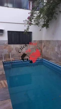 Imagem Lindo sobrado em rua sem saída,5 Dorms c suite, varanda ,piscina ,4 vagas,B.petropilis,São bernardo campo