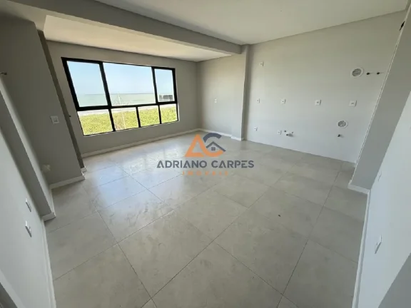 Imagem Apartamento novo, frente mar com 87m², 2 suítes e churrasqueira a carvão na Meia Praia - Navegantes Adriano Carpes Imóveis vende!
