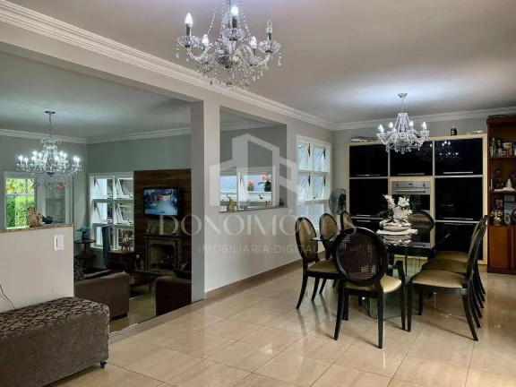 Imagem Casa alto padrão 318m² | 4 suítes | Piscina aquecida | 7 vagas | Swiss Park