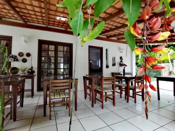 Imagem Casa 5 suítes e 3 vagas de garagem a 150m da beira-mar da Praia de Taquaras em Balneário Camboriú/SC