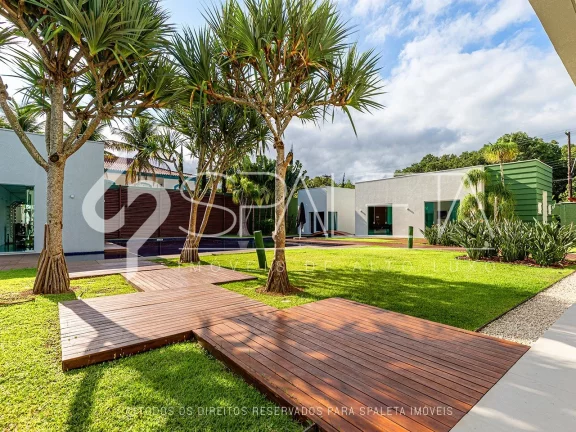 Imagem Mansão contemporânea com heliponto particular à venda no condomínio Jardim Acapulco no Guarujá