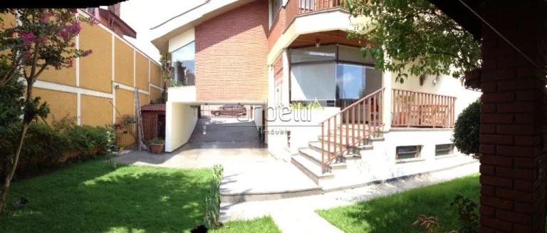 Imagem Sobrado com 383 metros quadrados de área útil, com 3 dormitórios sendo 3 suítes, 1 suíte com cl...