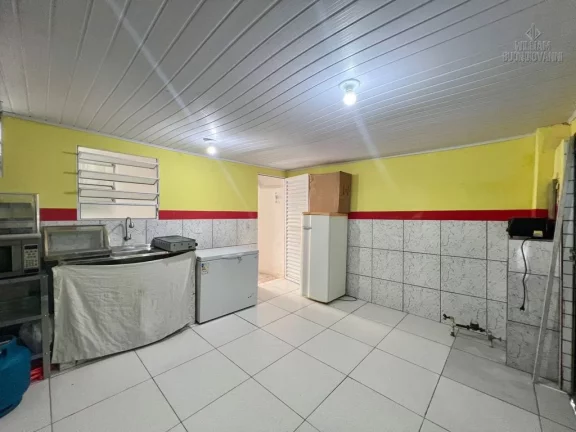 Imagem Casa 2 dormitórios com loja comercial no bairro Boqueirão