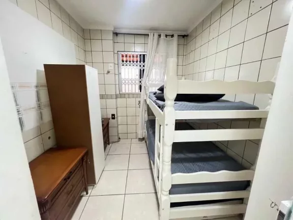 Imagem Apartamento diferenciado com 2 dormitórios sendo 1 suíte e 1 vaga de garagem a 350m da Praia Central
