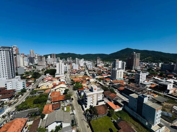 Imagem Apartamento com 3 suítes e 2 vagas de garagem em Balneário Perequê, Porto Belo/SC