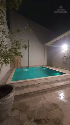 Imagem Casa de Alto Padrão 4 suítes, 3 vagas – Conforto e Tecnologia, Praia Grande-SP