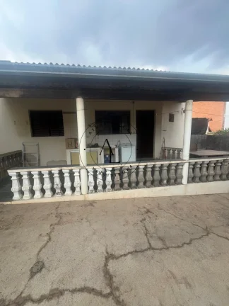 Imagem Casa Aconchegante com 3 Quartos, Edícula e Ótima Área Externa!