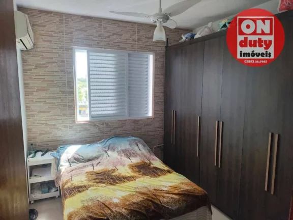 Imagem Apartamento com 2 dormitórios à venda, 64 m² por R$ 220.000,00 - Saboó - Santos/SP