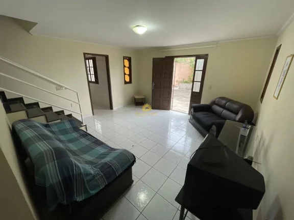 Imagem Encantadora casa duplex em Meaípe, Guarapari, ES! 4 quartos, sendo 1 suíte, 2 vagas de garagem. Lo...