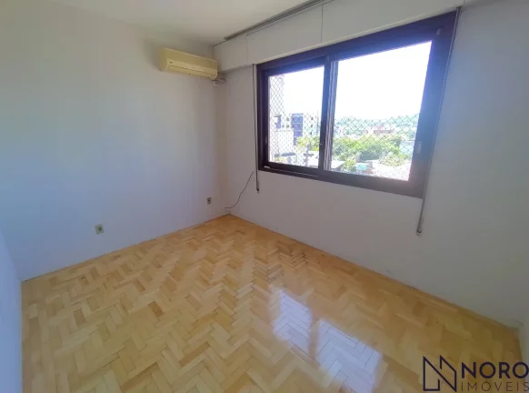 Imagem Apartamento Espaçoso e Ensolarado com 3 Dormitórios (1 suite) e Garagem no Bairr