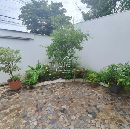 Imagem Casa à venda em Guarujá-SP na Vila Luis Antônio com 3 quartos, 1 suíte, 3 vagas de garagem e 160m² de área.