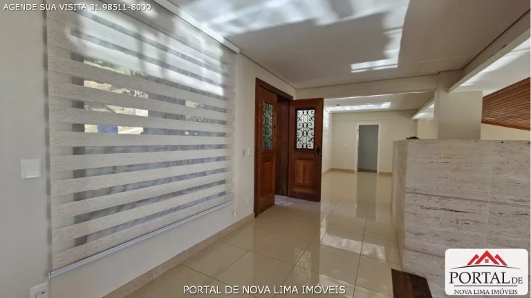 Imagem Casa a venda no Vila del Rey em Nova Lima. Casa com vista para a mata e para o condomínio Vale dos Cristais. Casa recebe sol da manhã