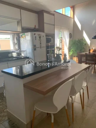 Imagem Casa térrea com sala de estar, sala de tv, lavabo, sala de jantar integrada à cozinha planejada e ...