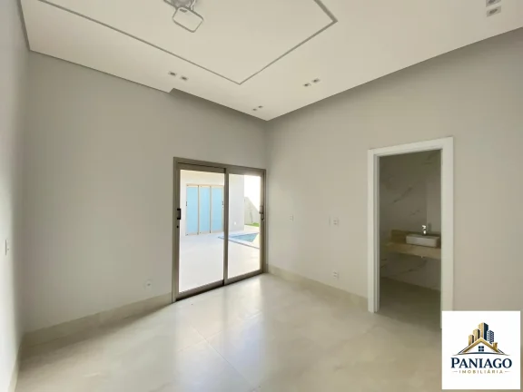 Imagem Casa de alto padrão com 3 suítes, cozinha gourmet e piscina com cascata