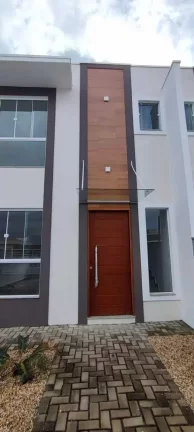 Imagem Casa com 2 Dormitórios sendo 1 suíte e 1 vaga na Garagem em Navegantes.