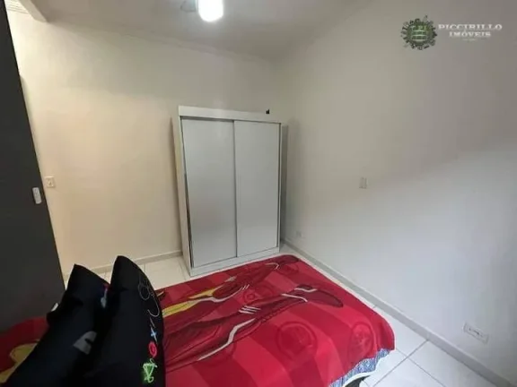 Imagem Sobrado com 3 dormitórios à venda, 125 m² por R$ 650.000 - Caiçara - Praia Grande/SP