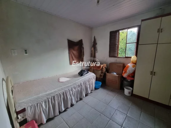 Imagem Chácara com 3 residências a poucos metros da cidade