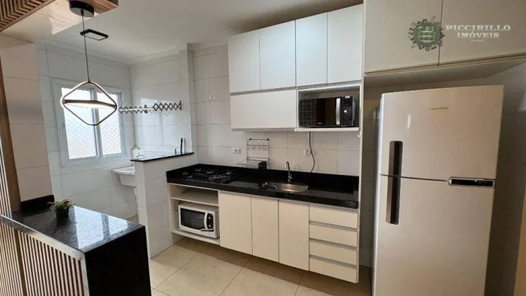 Imagem Apartamento com 2 dormitórios à venda, por R$ 630.000 - Maracanã - Praia Grande/SP