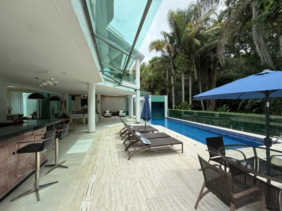 Imagem Incrível mansão à venda em Riviera de São Lourenço Módulo 21: 6 quartos, 6 suítes, 3 salas, 705m². Venha conferir!