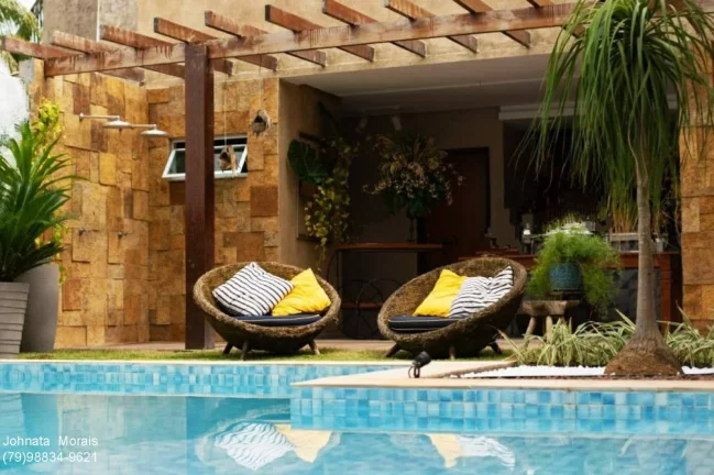Imagem Casa à venda no Bairro Aruana - 4 suítes, piscina e área gourmet | Contato: (79) 98834-9621