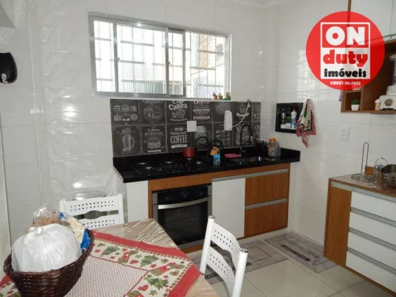 Imagem Casa com 2 dormitórios à venda, 73 m² por R$ 320.000,00 - Areia Branca - Santos/SP