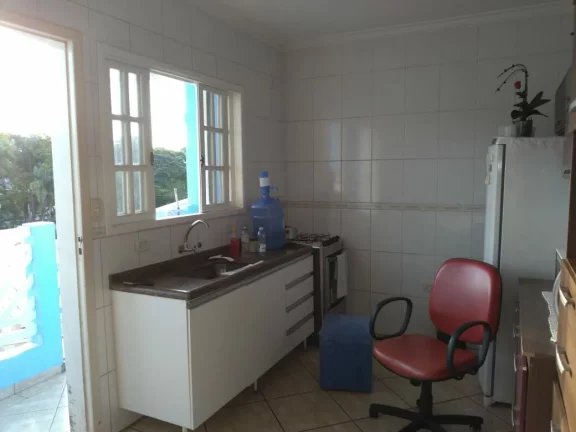 Imagem SOBRADO PADRÃO COM FRENTES PARA DUAS RUAS EM SANTO ANDRE, COM 3 DORMITÓRIOS E UM SALÃO COMERCIAL.