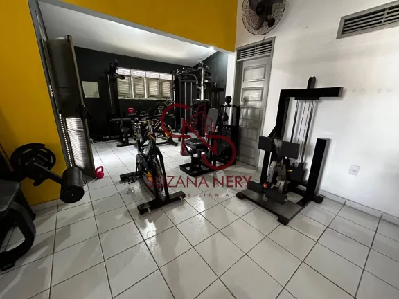 Imagem Prédio comercial com uma casa, 2 lojas e 11 kitinets