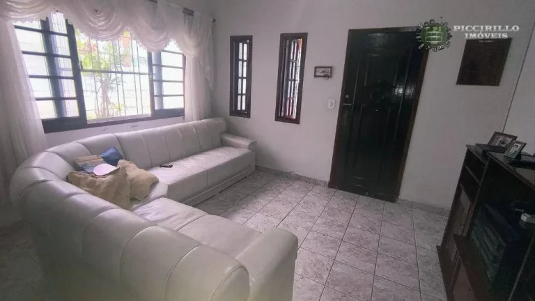 Imagem Casa com 3 dormitórios à venda, 240 m² por R$ 700.000,00 - Caiçara - Praia Grande/SP