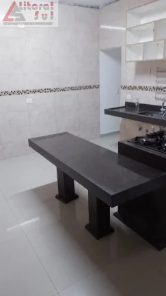 Imagem Casa à venda em Praia Grande-SP, bairro Ocian: 2 quartos, 1 sala, 1 banheiro, 2 vagas, 150m². Imperdível oportunidade!