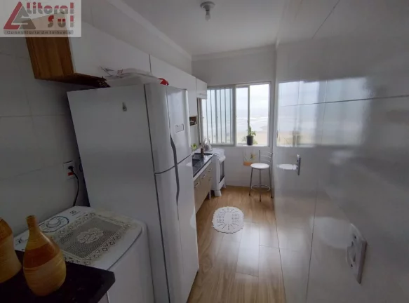 Imagem Apartamento à venda em Praia Grande-SP, bairro Mirim: 1 quarto, 1 sala, 1 banheiro, 1 vaga, 40m² de área.
