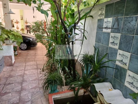 Imagem Imperdível oportunidade! Casa em condomínio à venda no Rio de Janeiro-RJ, 4 quartos, 2 suítes, 2 salas, 3 banheiros, 4 vagas, 230m².