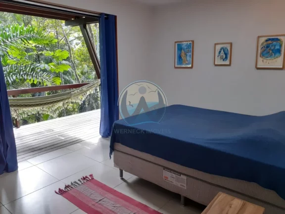 Imagem Casa de luxo em condomínio exclusivo em Ubatuba-SP, bairro Promirim: 3 quartos, 3 banheiros, 180m² de área.