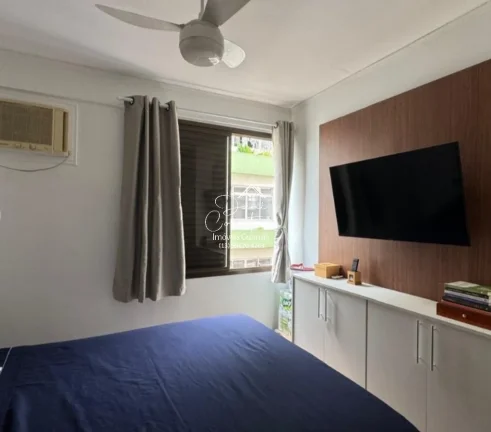 Imagem Aluguel de apartamento no Jardim Astúrias, Guarujá-SP: 2 quartos, 1 suíte, 2 salas, 2 banheiros, 1 vaga de garagem, 85m² de área.