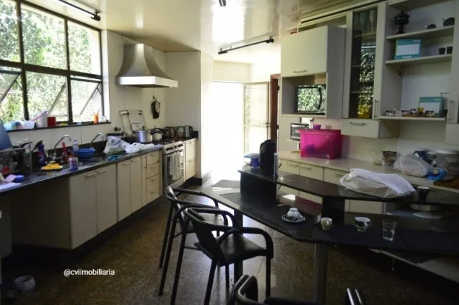 Imagem Descubra essa incrível casa à venda na Avenida Cremona, localizada no bairro Bandeirantes (Pampulh...