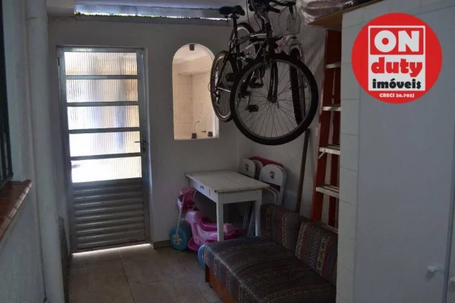Imagem Sobrado à venda, 122 m² por R$ 1.350.000,00 - Ponta da Praia - Santos/SP