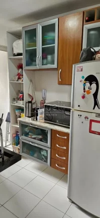 Imagem Apartamento com 47 M², 2 dormitórios, 1 banheiro, sala, cozinha, área de serviços e 1 vaga de ga...