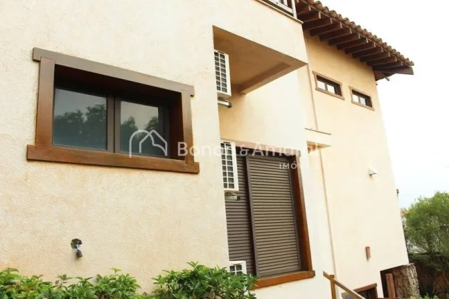Imagem Casa em condomínio com 1000 m² e 7 quartos