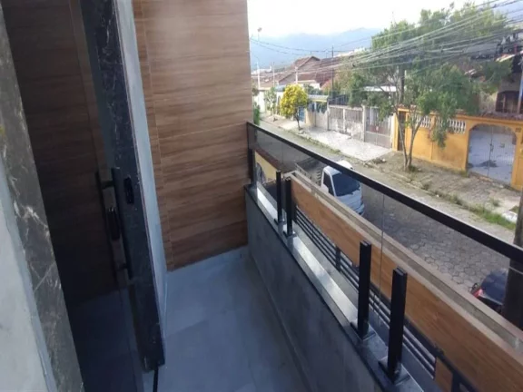 Imagem Sobrado com 2 dormitórios à venda, 77 m² por R$ 350.000,00 - Caiçara - Praia Grande/SP