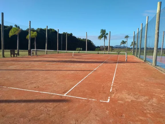 Imagem Terreno à venda em Imbituba - Condomínio fechado com piscina, quadra poliesportiva acesso para lagoa