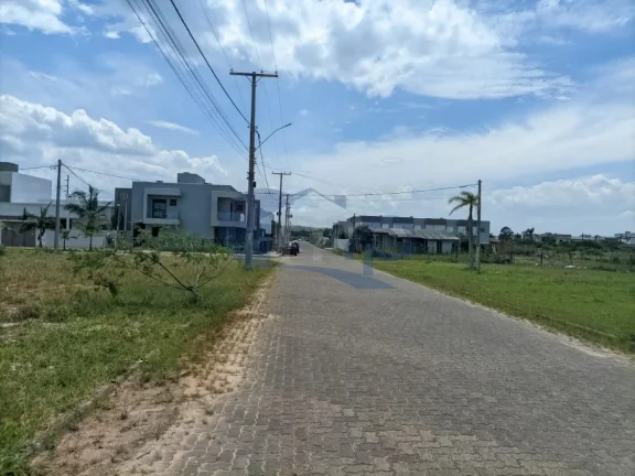 Imagem Casa geminada com 3 dormitórios no Loteamento Morada das Palmeiras em Torres/RS