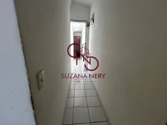 Imagem Prédio comercial com uma casa, 2 lojas e 11 kitinets