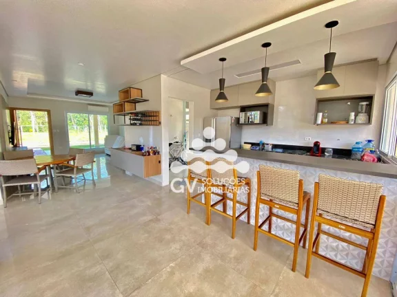 Imagem Sobrado com 4 dormitórios à venda, 205 m² por R$ 2.000.000,00 - Condomínio Capitanias - Ubatuba/SP