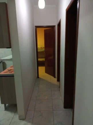 Imagem Casa com 2 dormitórios à venda, 72 m² por R$ 450.000 - Caiçara - Praia Grande/SP
