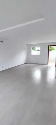 Imagem Casa com 2 Dormitórios sendo 1 suíte e 1 vaga na Garagem em Navegantes.
