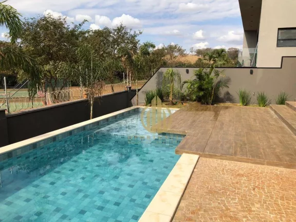Imagem Sobrado com 4 suítes com piscina integrada na área de lazer no Alphaville
