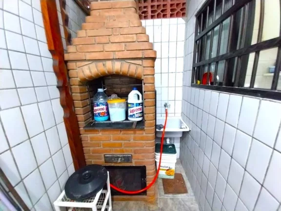 Imagem Sobrado com 2 dormitórios à venda, 95 m² por R$ 360.000,00 - Caiçara - Praia Grande/SP