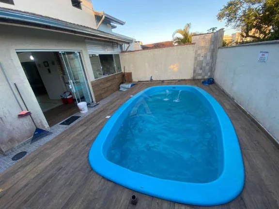 Imagem SOBRADO COM PISCINA , 4 DORMITÓRIOS SENDO 1 SUÍTE, RAINHA DO MAR